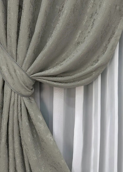 High-quality grey linen drapes with a subtle marble texture, enhancing modern and industrial interiors.
