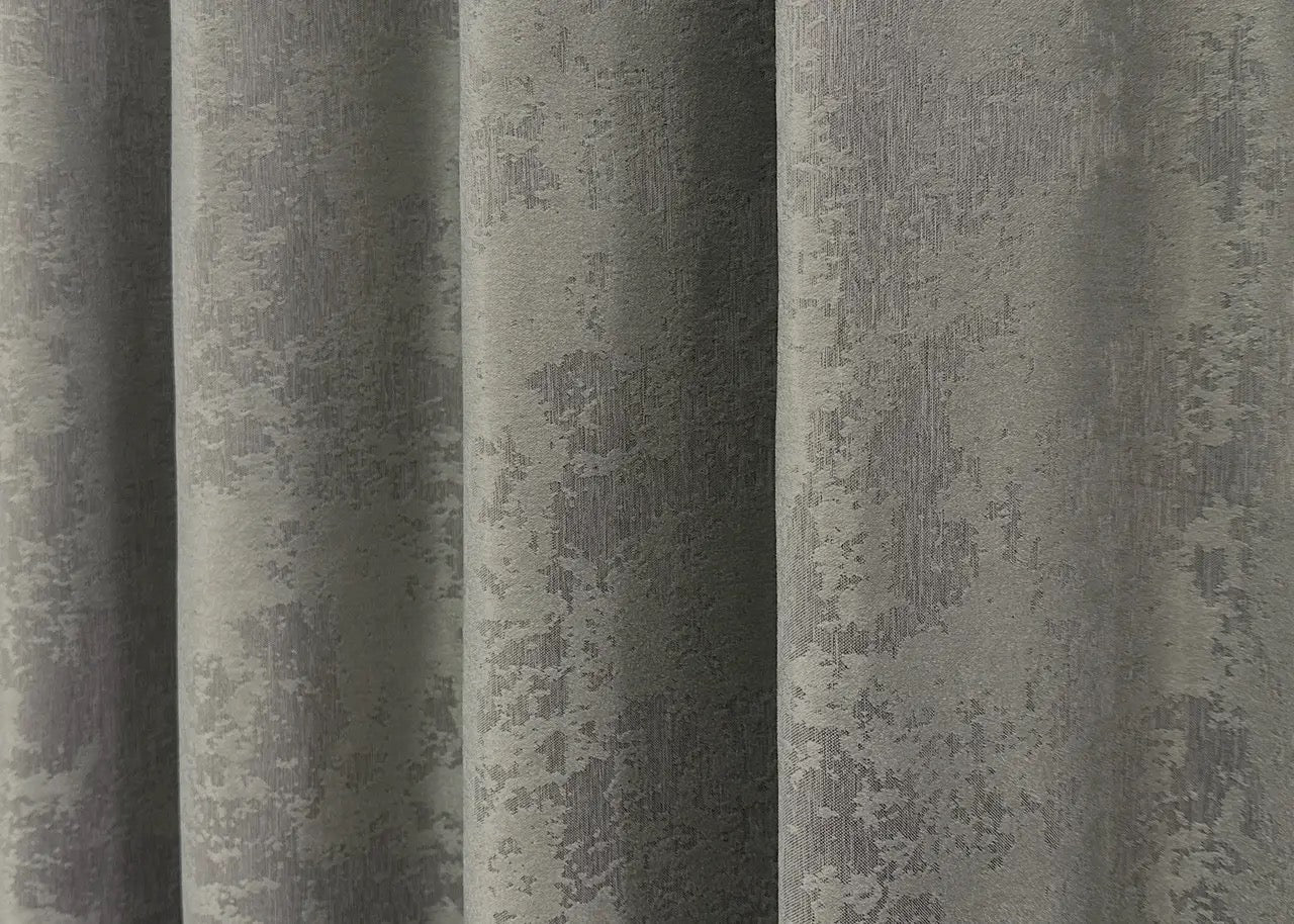 Classic-style graphite grey jacquard curtains with matching tie-backs, ideal for achieving a refined and polished window treatment.