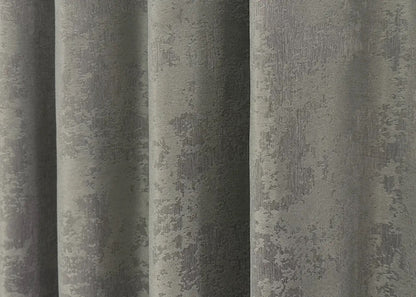 Classic-style graphite grey jacquard curtains with matching tie-backs, ideal for achieving a refined and polished window treatment.