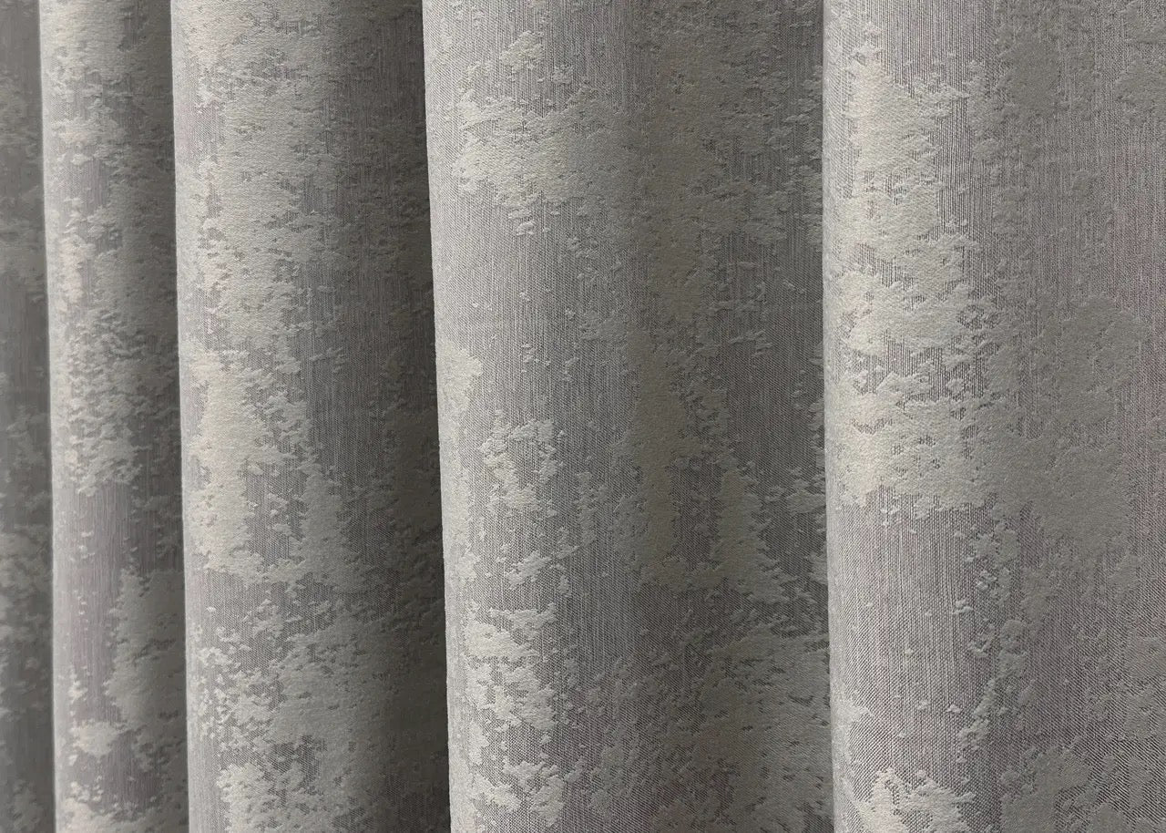 Classic-style light grey jacquard curtains with matching tie-backs, ideal for a polished and sophisticated window décor.
