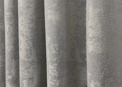 Classic-style light grey jacquard curtains with matching tie-backs, ideal for a polished and sophisticated window décor.
