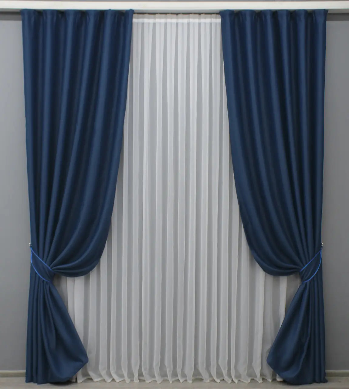 Classic royal blue blackout curtains, perfect for contemporary and traditional spaces.
