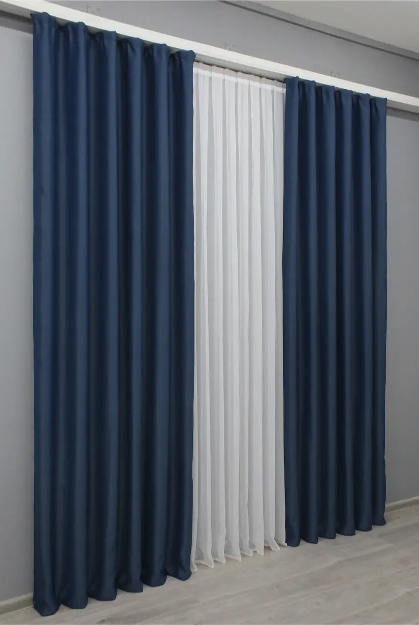 Cobalt blue blackout curtains with a premium finish for stylish home décor.
