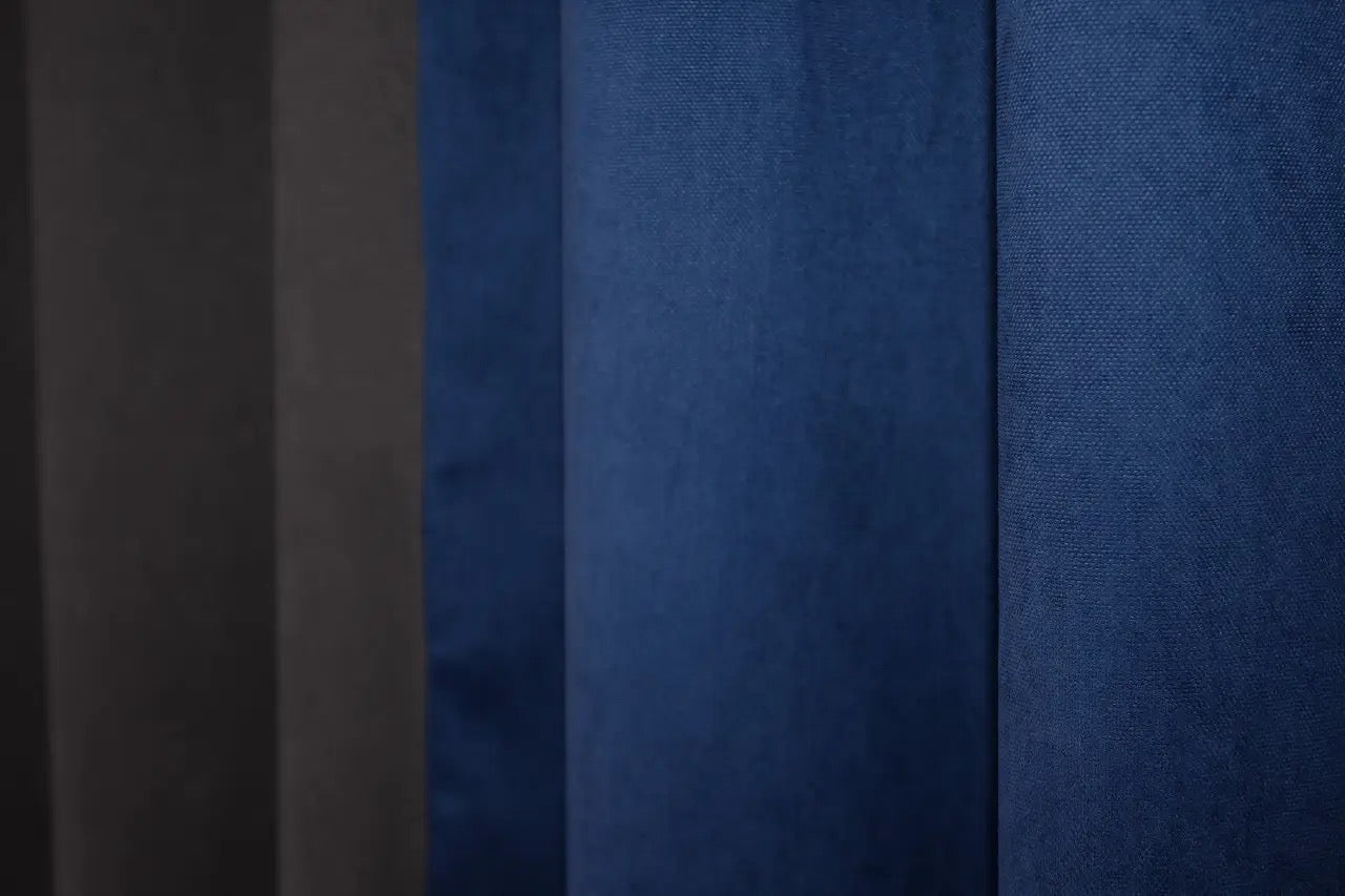 Refined two-tone combined microvelvet curtains in graphite and blue, perfect for modern and classic interiors.
