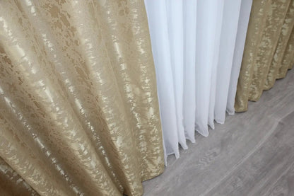 Classic and refined beige linen curtains, offering privacy while allowing soft, diffused natural light.
