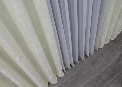 Modern cream marble-patterned linen curtains, designed for chic and sophisticated home styling.
