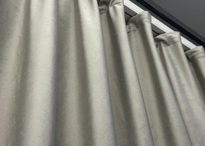 Metallic satin velvet room-darkening curtains with a silky feel, perfect for contemporary, luxurious, and minimalist spaces.
