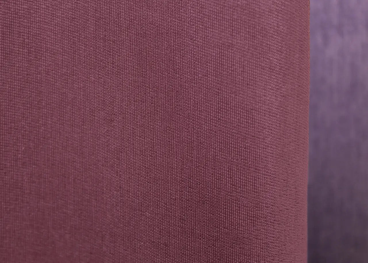 Elegant raspberry and violet two-tone curtains designed for maximum visual impact and modern ambiance in eclectic interiors.
