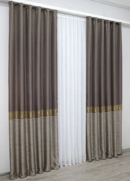 Dark cocoa linen curtains with gold accents, perfect for adding a touch of warmth and elegance to any space.
