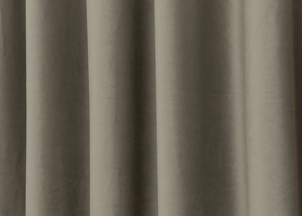 Dark greige velvet blackout drapes, designed for privacy and a sophisticated, modern atmosphere.
