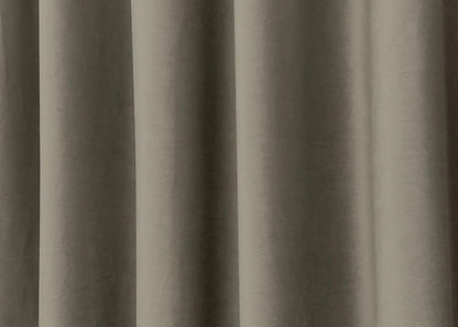 Dark greige velvet blackout drapes, designed for privacy and a sophisticated, modern atmosphere.
