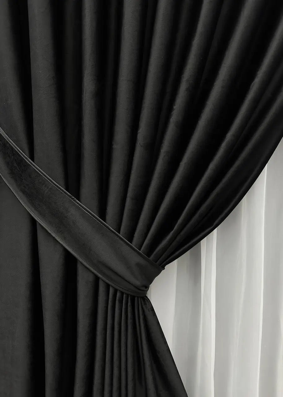 Dark graphite velvet drapes, crafted for a refined and elegant look in bedrooms and living rooms.
