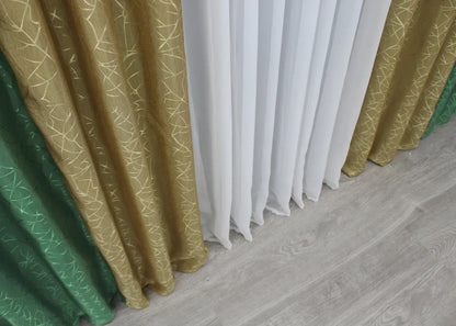 Dark green and gold jacquard curtains, bringing a bold contrast and luxurious aesthetic to modern and classic interiors alike.
