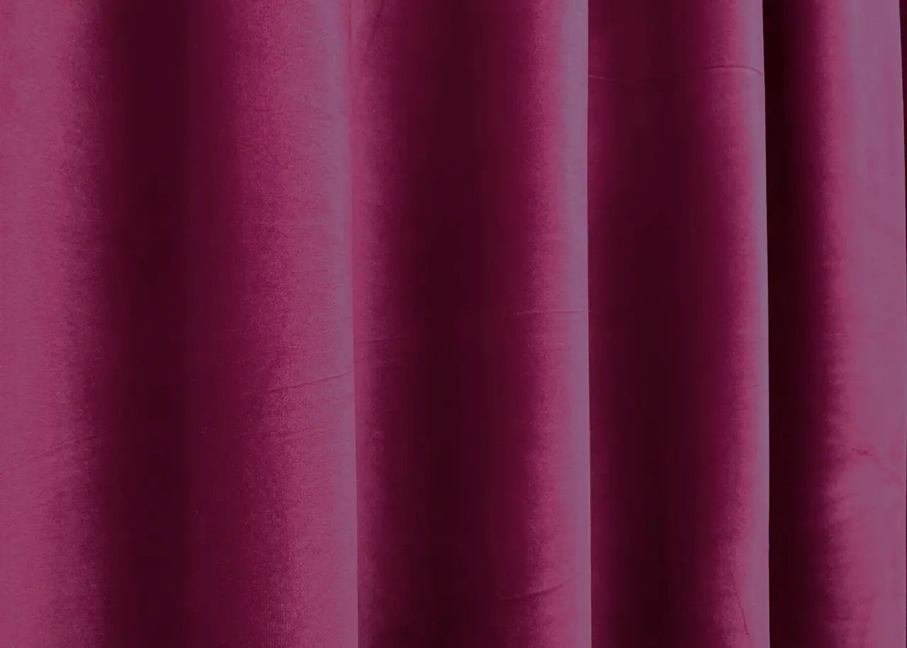 Dark magenta velvet blackout drapes, ideal for luxurious and stylish window treatments.
