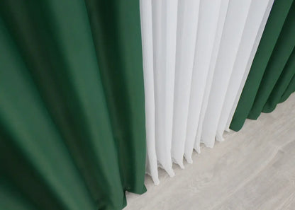 Dark olive blackout curtains with a timeless and elegant finish.
