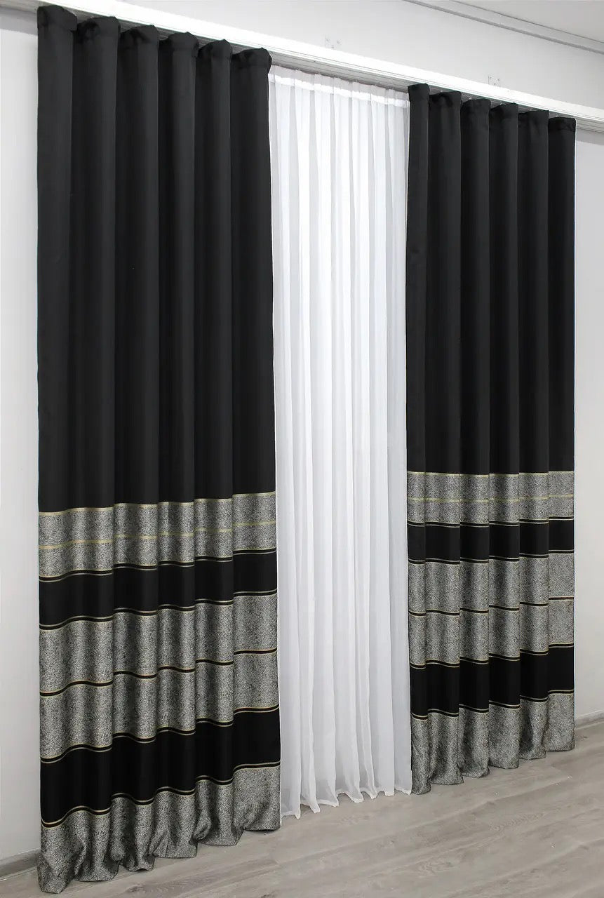 Stylish deep black-grey linen curtains with a subtle gold stripe, offering elegance and functionality.
