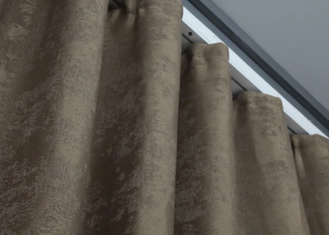 Deep cocoa brown curtains with a sophisticated tone, seamlessly blending into elegant interior designs.
