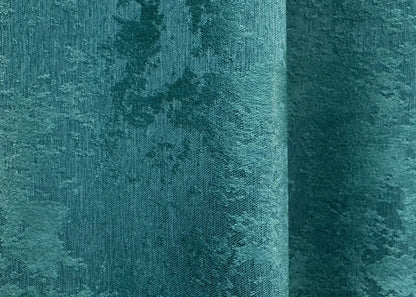 High-quality deep sea green curtains made from premium jacquard fabric, complementing modern and traditional home interiors.
