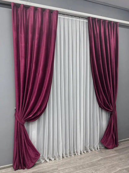 Deep purple velvet drapes with premium-quality fabric, ideal for modern and classic interiors.
