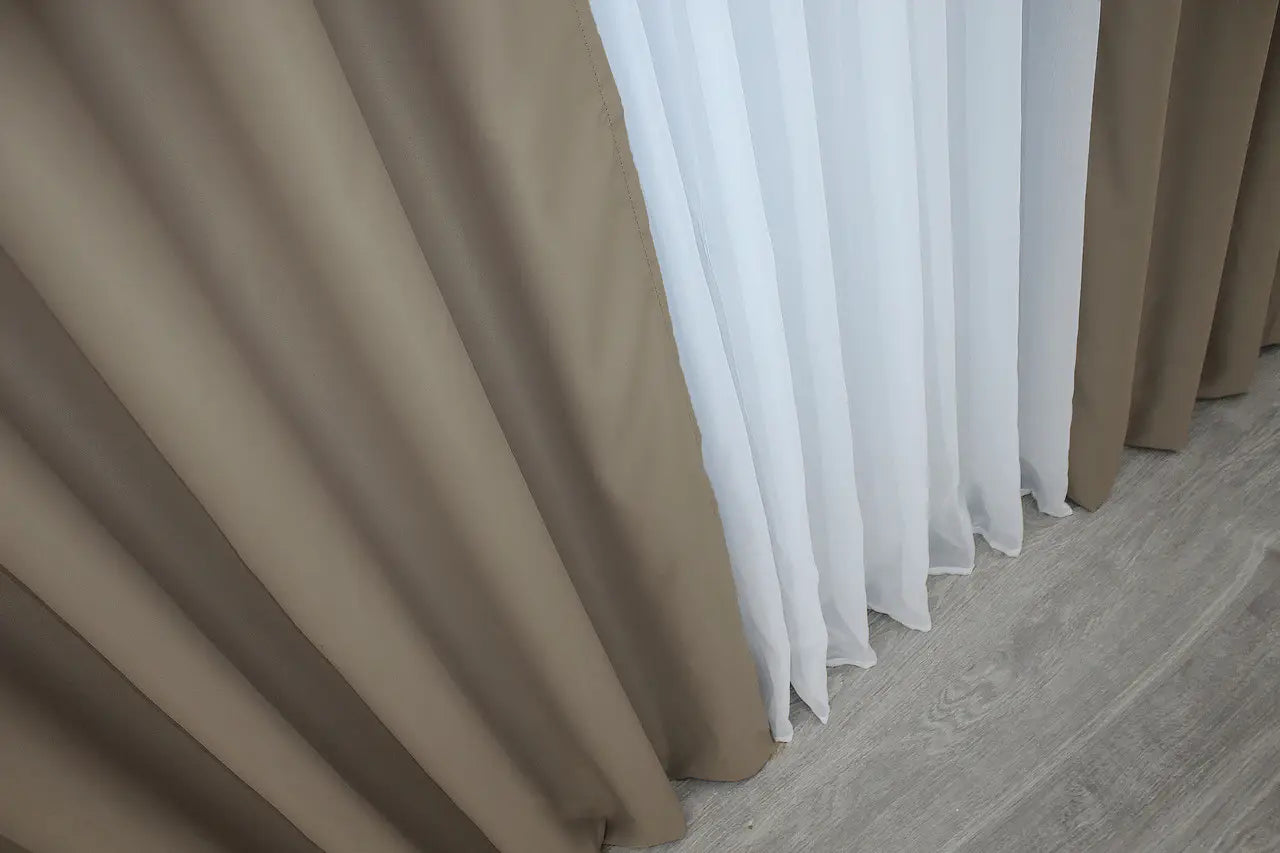 Deep espresso blackout curtains with a refined and contemporary design.
