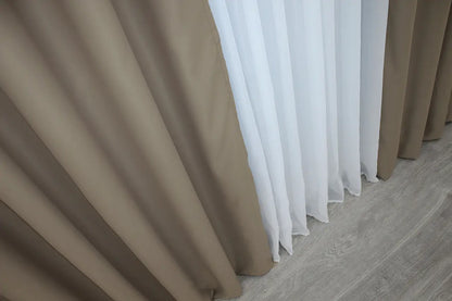 Deep espresso blackout curtains with a refined and contemporary design.
