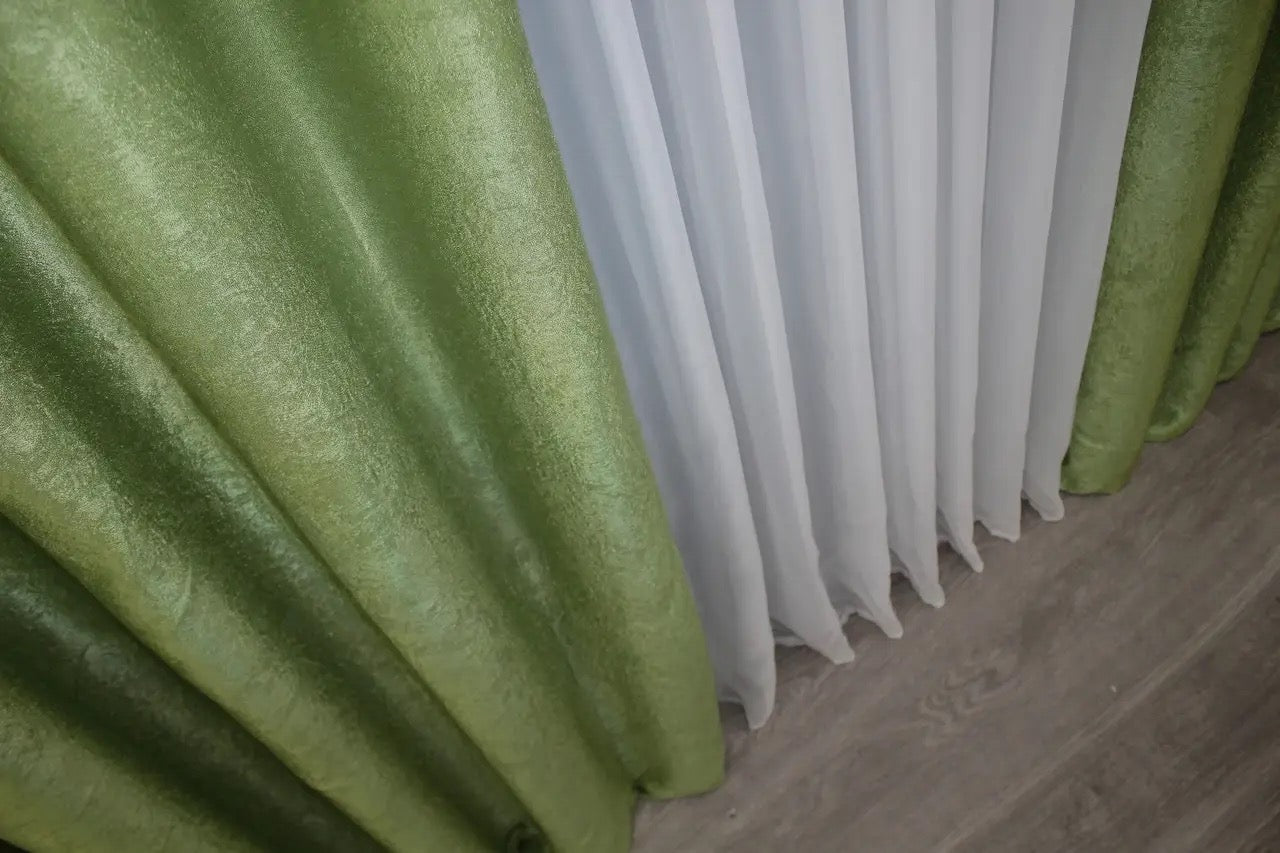 Delicate light olive linen curtains, crafted from high-quality breathable fabric, enhancing comfort and relaxation in any home.
