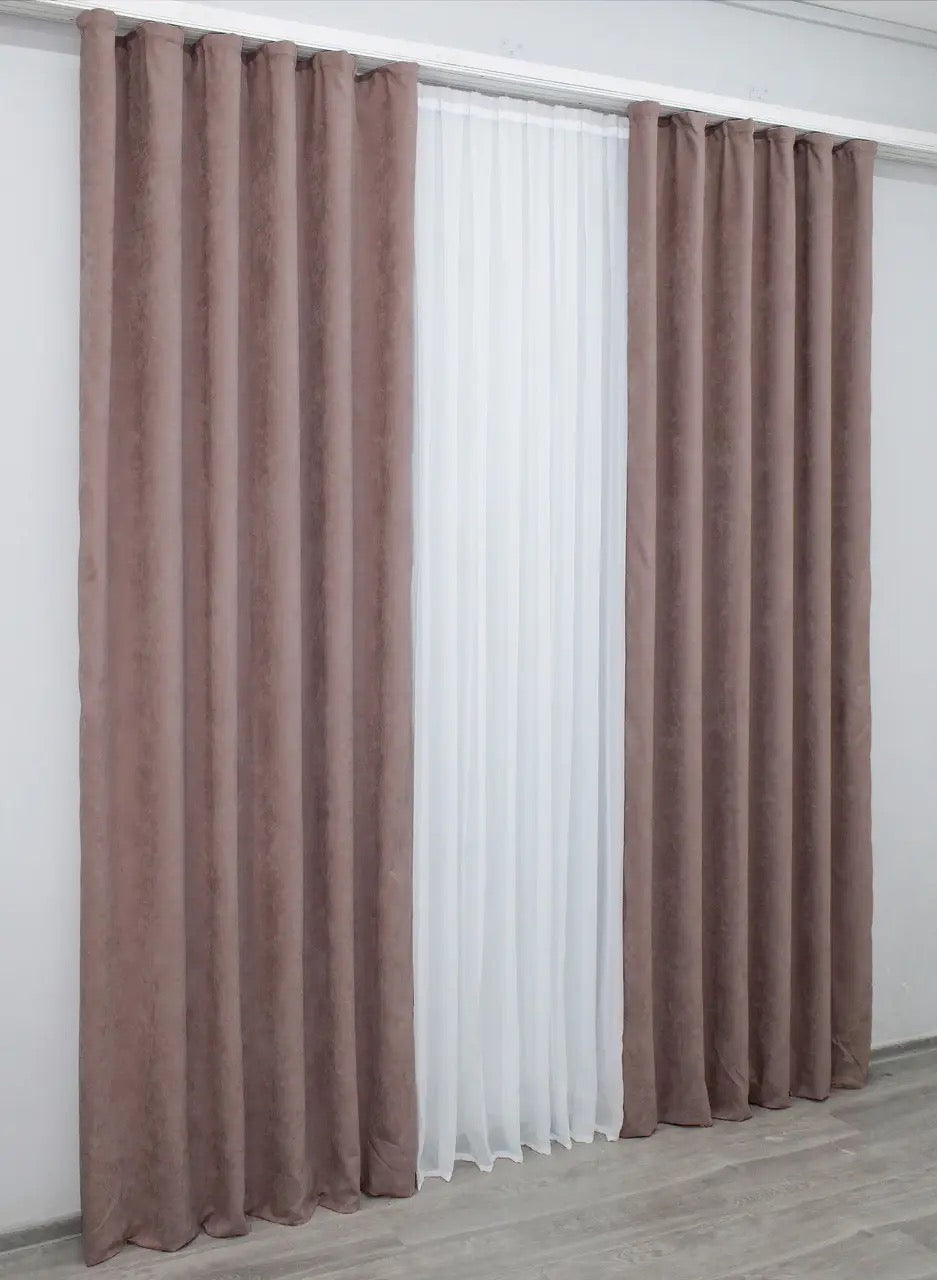 High-quality microvelvet curtains in powder pink, providing privacy while enhancing natural light.
