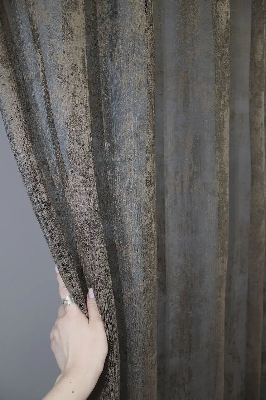 Earthy brown curtain for natural light and warm interiors
