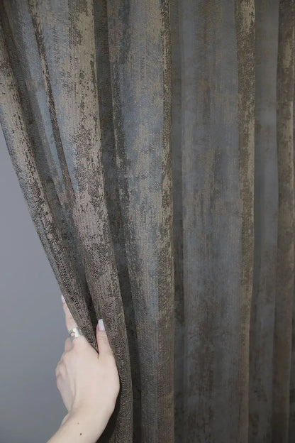 Earthy brown curtain for natural light and warm interiors
