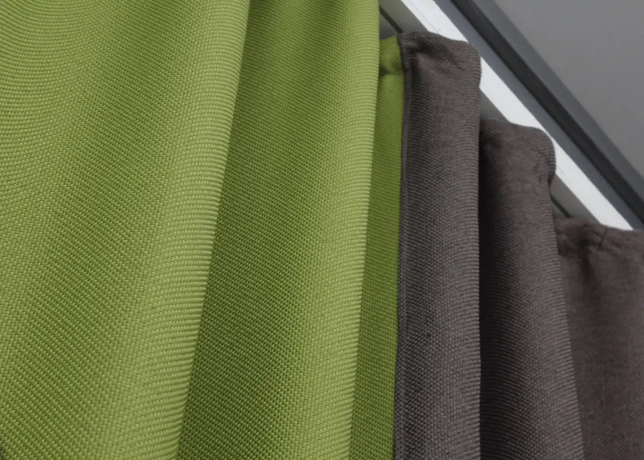 Earthy grey-brown linen blackout curtains paired with a refreshing lime green accent, offering a perfect blend of warmth and energy.
