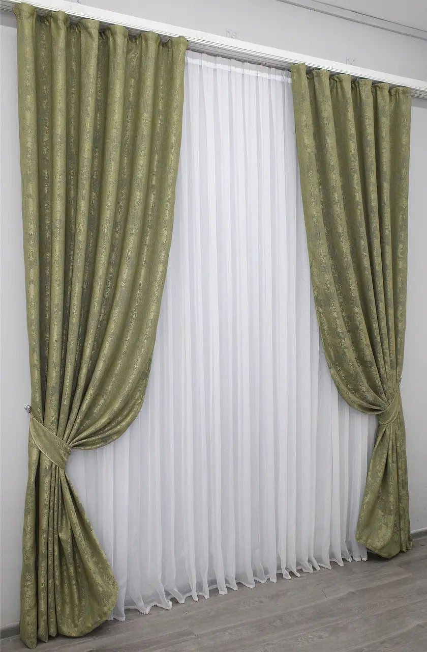 Stylish olive jacquard curtains designed for privacy and light filtering, allowing soft natural light to create a calming ambiance.
