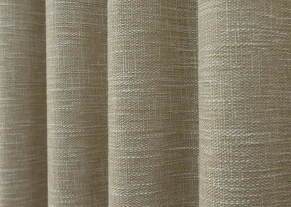 Eco-friendly light beige linen curtains, crafted from breathable fabric for soft light diffusion and privacy.
