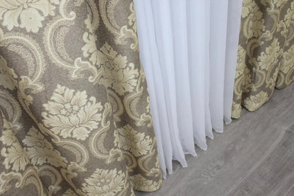 High-quality cappuccino and beige linen curtains with a delicate pattern, complementing refined interiors.
