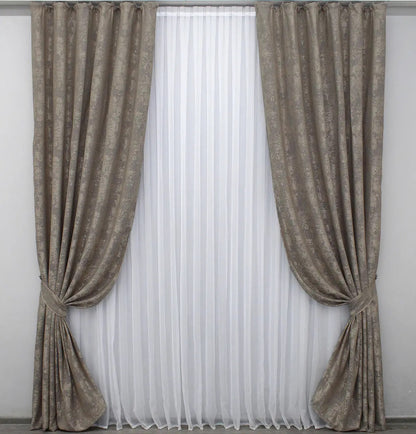 Luxury beige-grey jacquard curtains featuring a delicate woven pattern, enhancing modern and classic home interiors.
