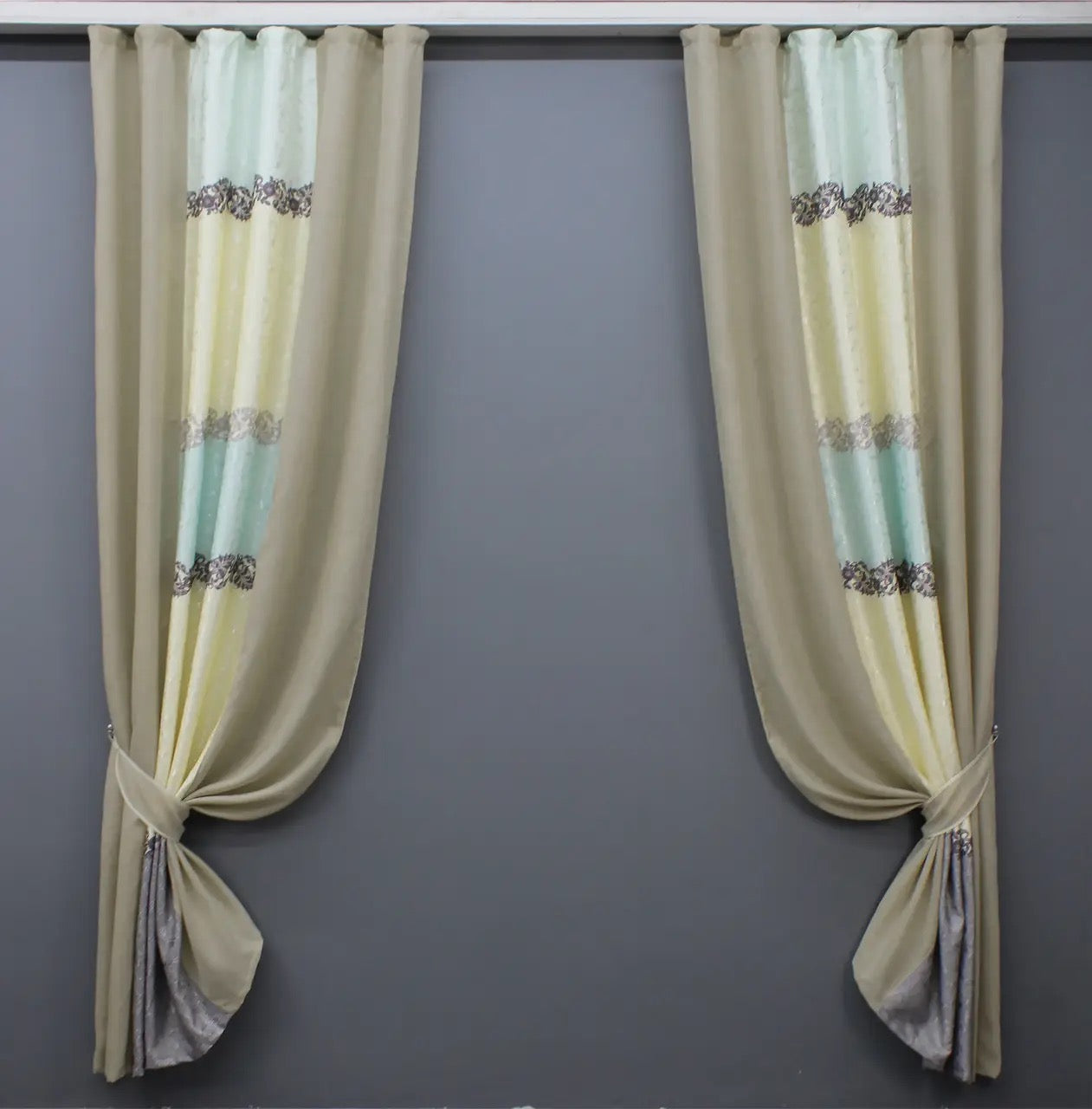 Elegant two-tone beige and turquoise linen curtains, adding a refreshing touch to your home with a modern coastal aesthetic.
