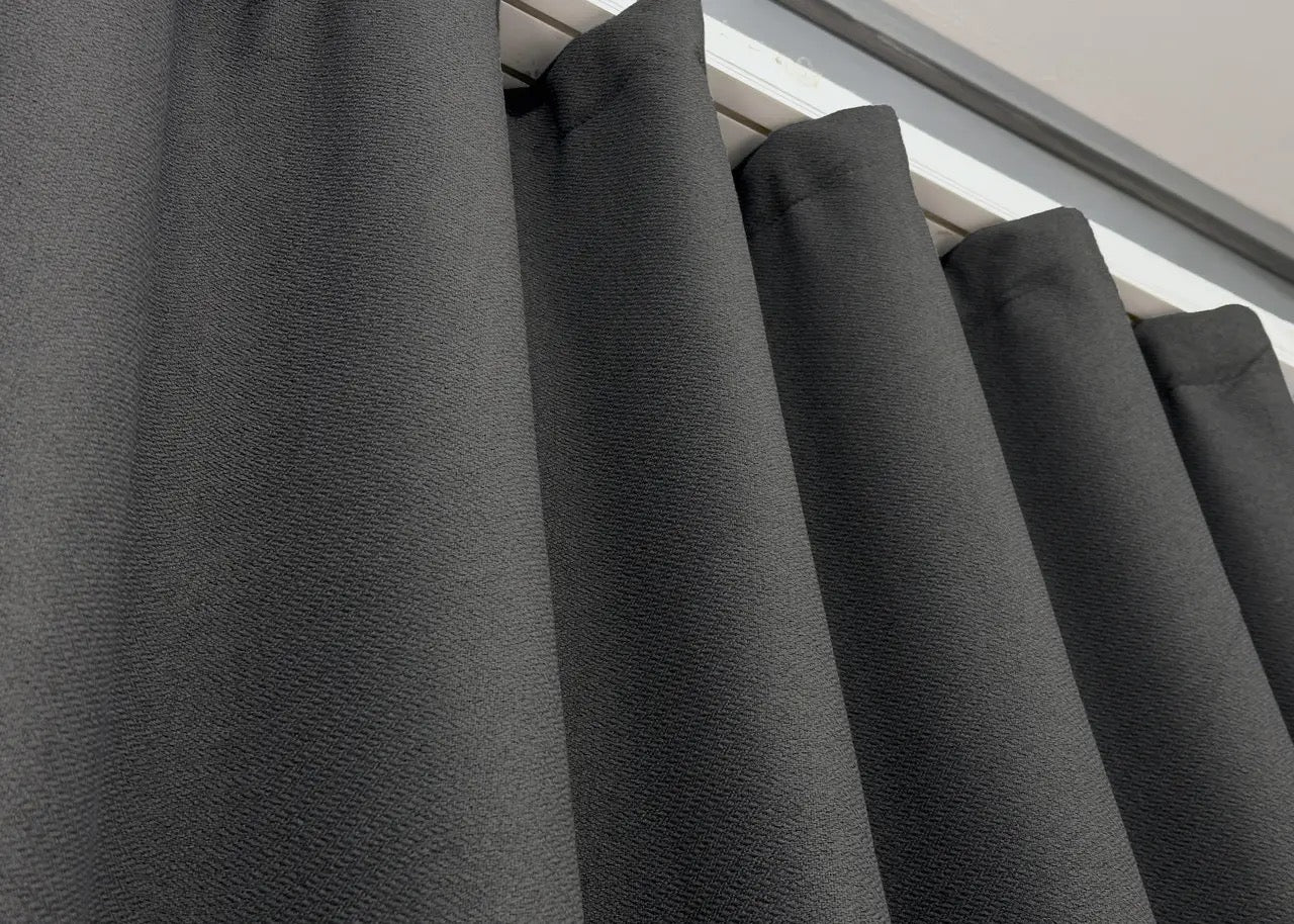 100% blackout graphite linen drapes with soundproofing and thermal insulation, designed for noise-sensitive interiors.
