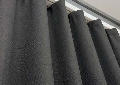 100% blackout graphite linen drapes with soundproofing and thermal insulation, designed for noise-sensitive interiors.
