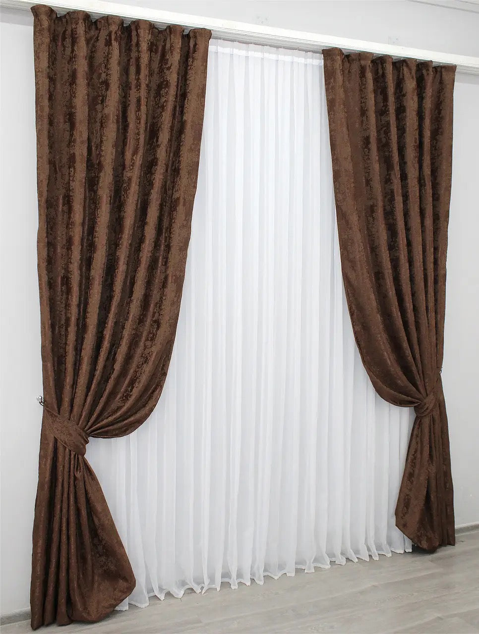 Luxury chocolate brown jacquard curtains with rich, textured fabric, perfect for classic and modern home interiors.
