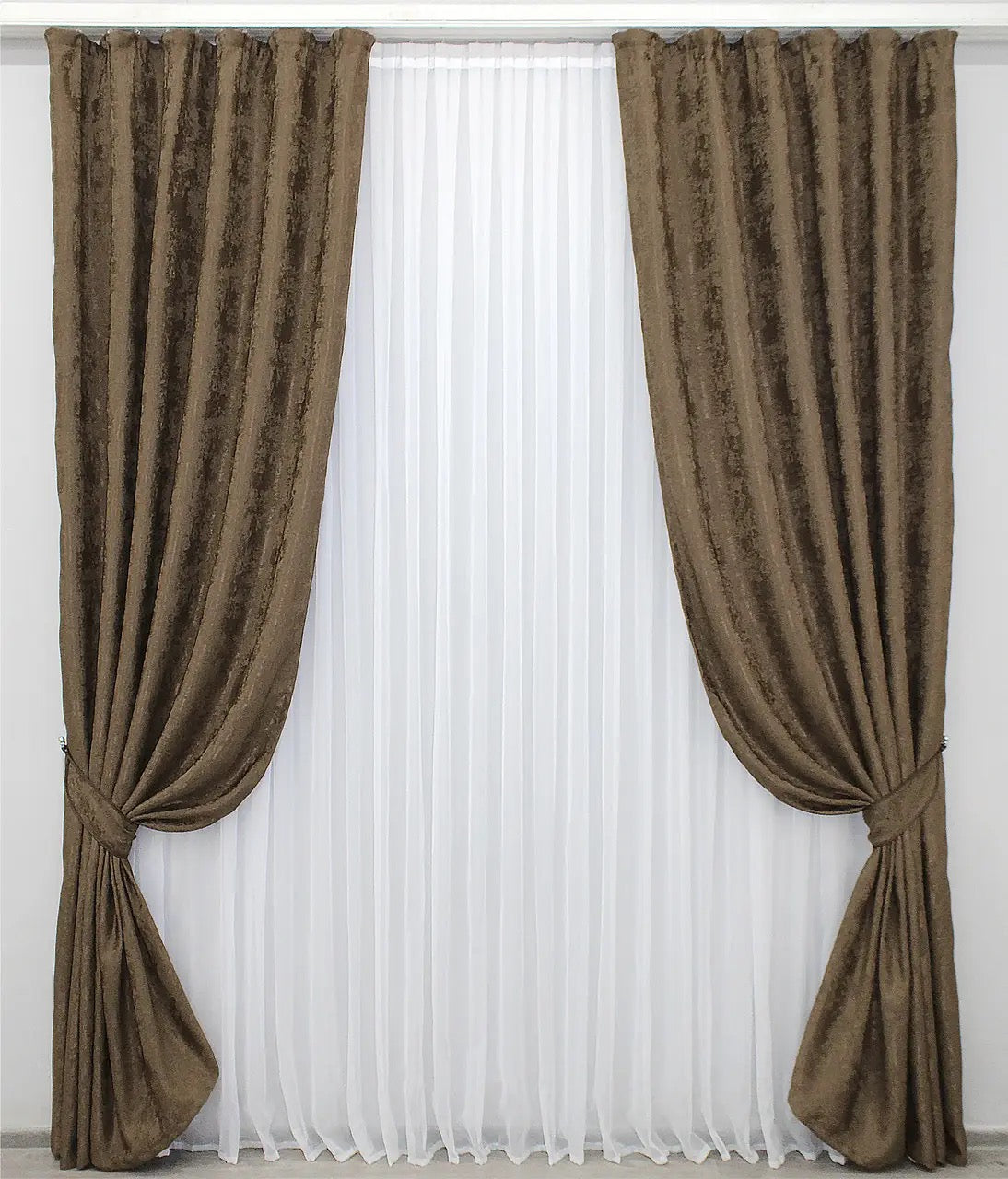 Luxury brown jacquard curtains featuring a deep, textured design, enhancing living rooms and bedrooms with a refined touch.
