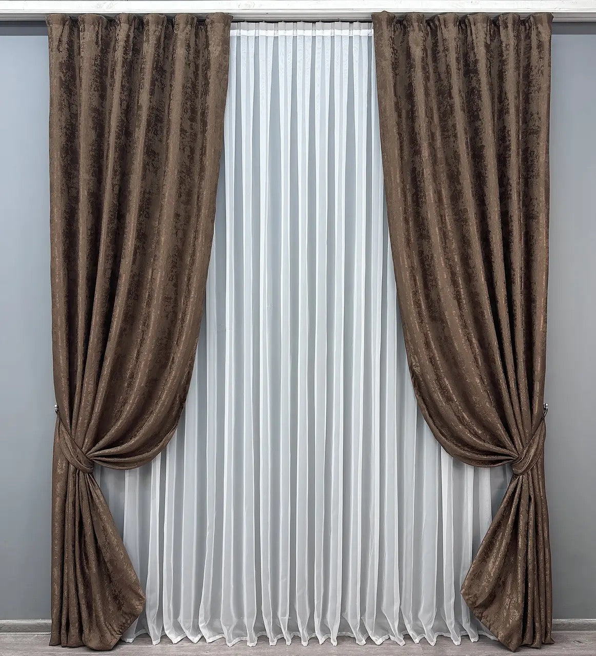 Luxury brown jacquard curtains featuring a textured design, enhancing living rooms and bedrooms with timeless elegance.
