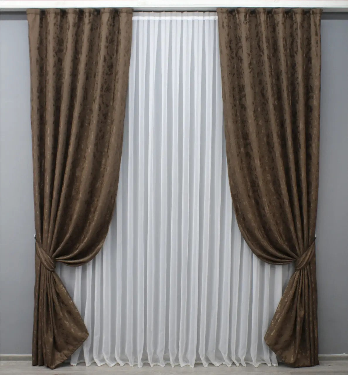 Soft-textured brown linen drapes, designed to enhance both modern and classic interiors.

