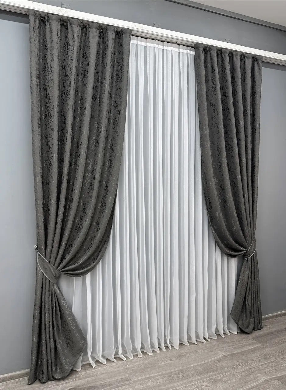 Premium brown linen drapes featuring a subtle marble effect, perfect for adding warmth to any space.
