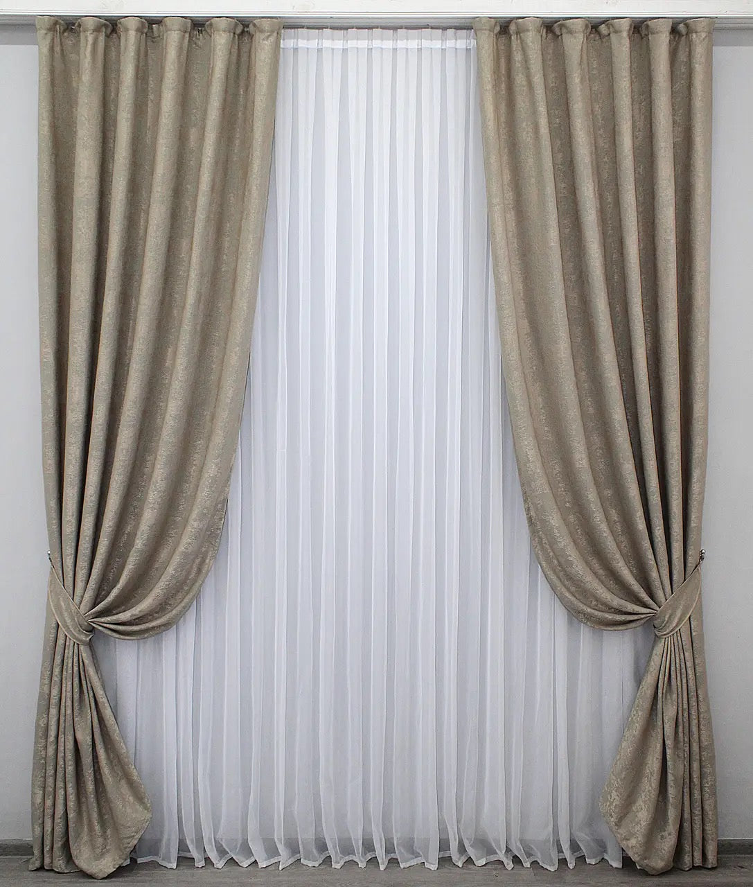 Luxury cappuccino jacquard curtains featuring a warm beige tone, adding sophistication to any living room or bedroom.
