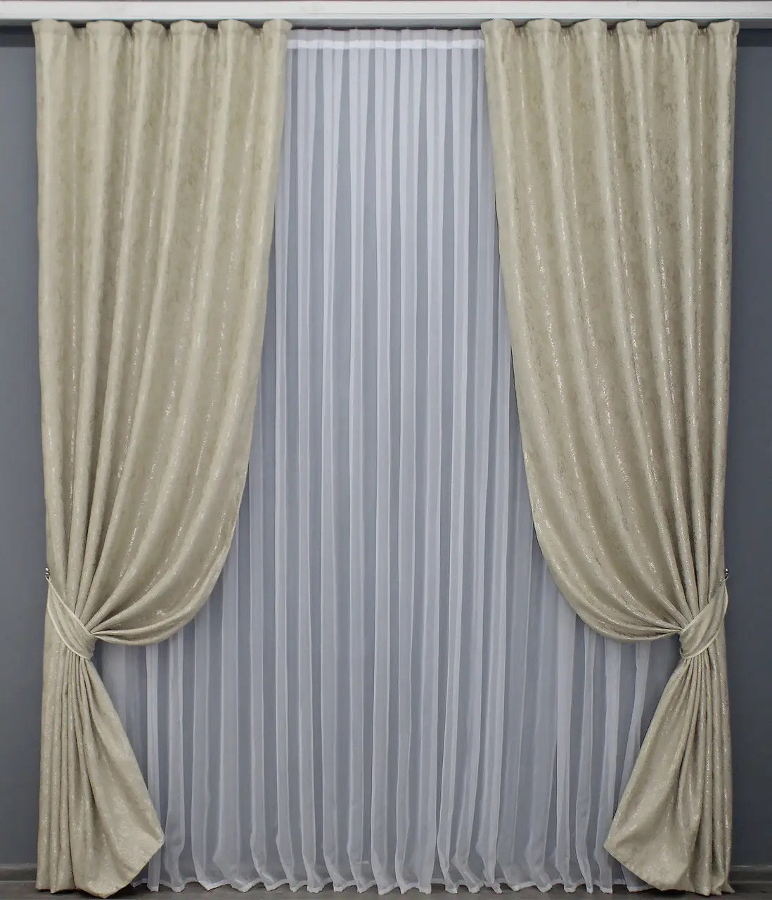 Premium champagne gold linen drapes with a delicate marble pattern, perfect for luxurious and refined interiors.
