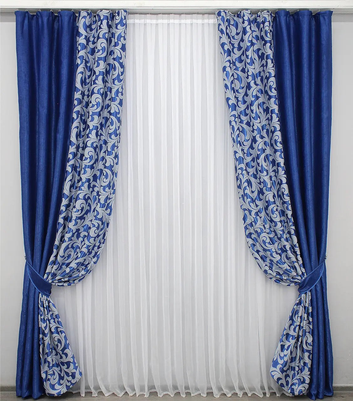 Luxurious combined dimout curtains in rich blue and sleek grey, ideal for modern and classic interior styles.
