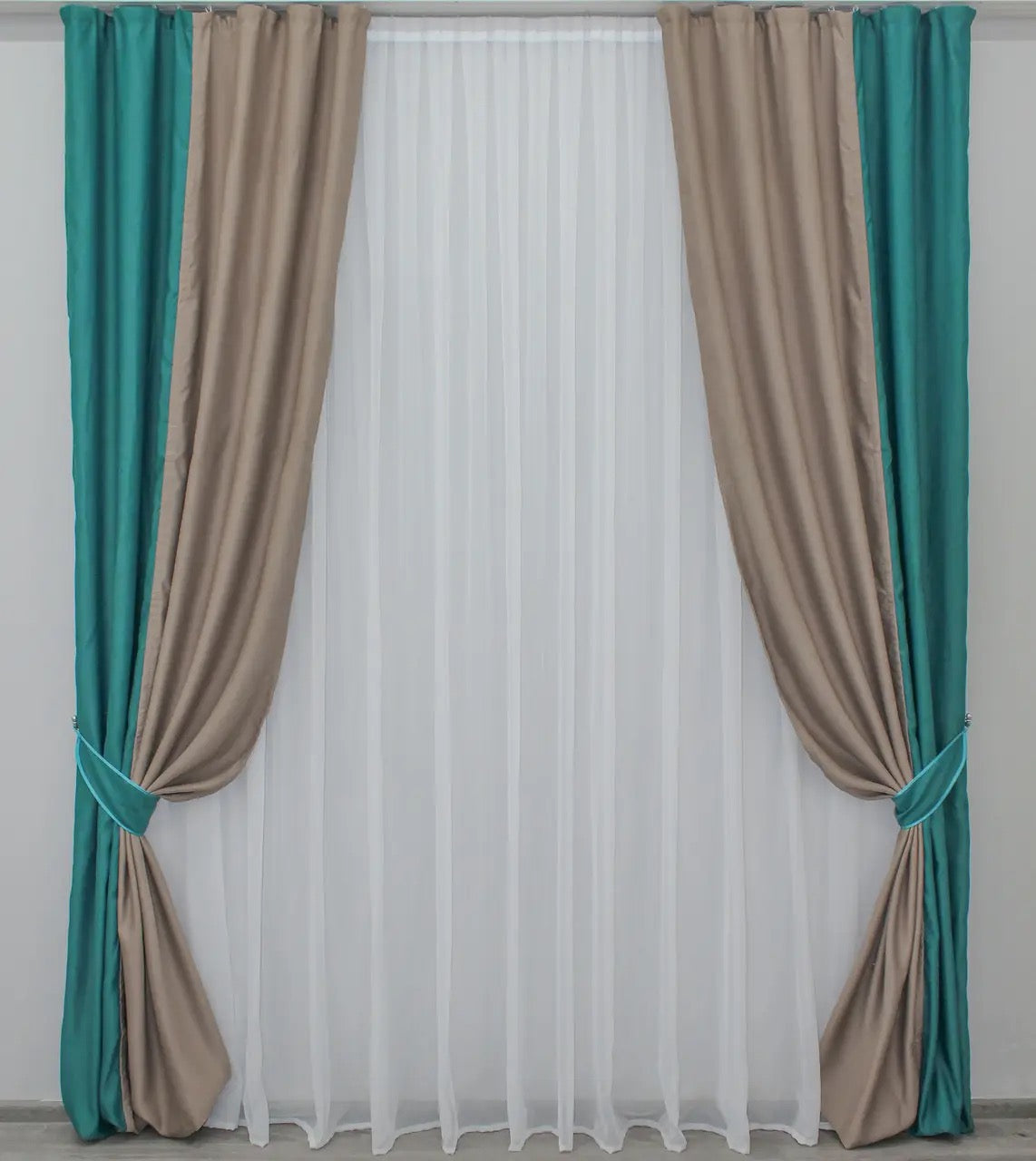 Elegant combined dimout curtains in a stunning blend of deep turquoise and warm cocoa brown, ideal for bedrooms and living rooms.
