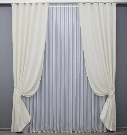 Soft-textured cream linen drapes, adding warmth and sophistication to any modern or classic home.
