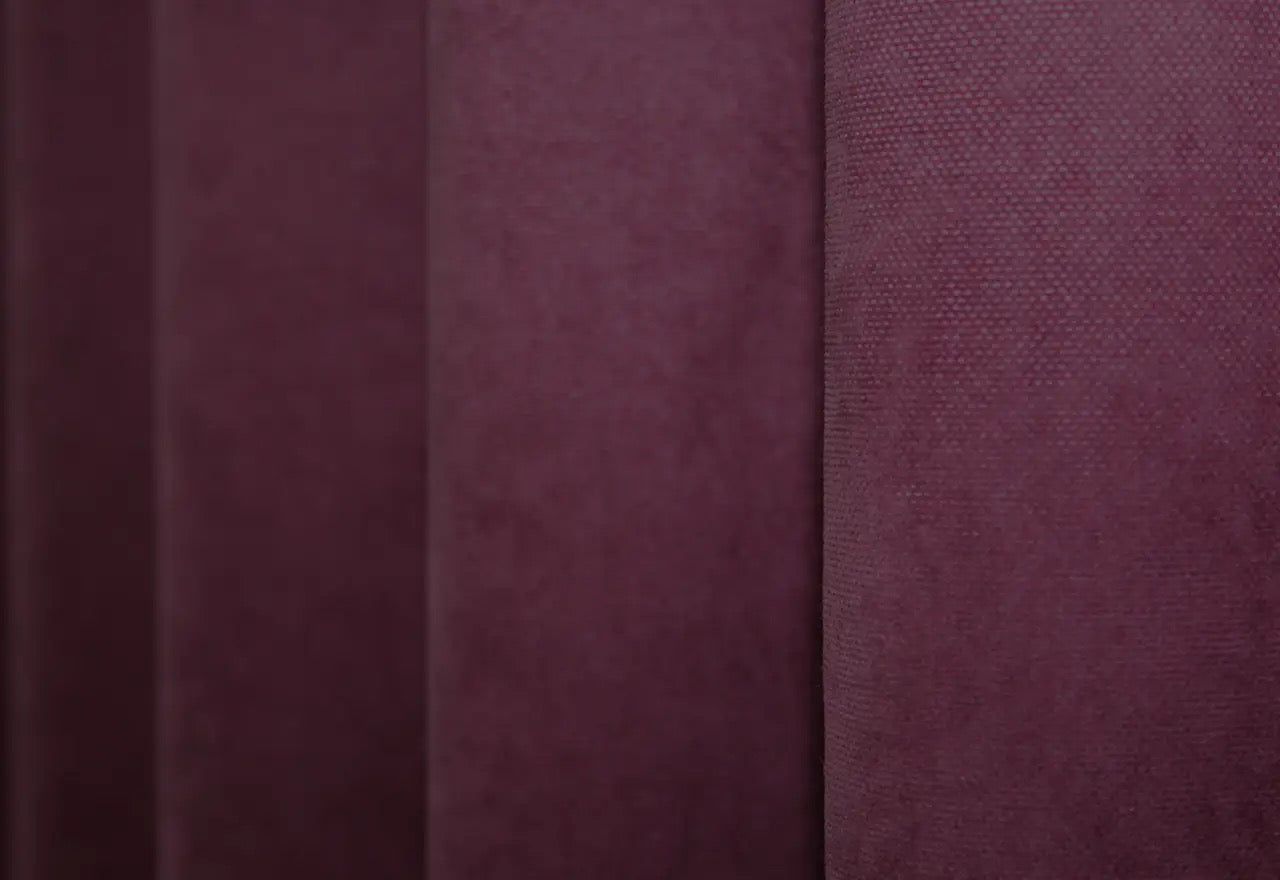 Soft-touch burgundy microvelvet drapes with an elegant flow, perfect for cosy and romantic spaces.
