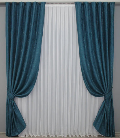 Premium deep blue linen drapes with a delicate marble pattern, designed for luxurious and stylish spaces.
