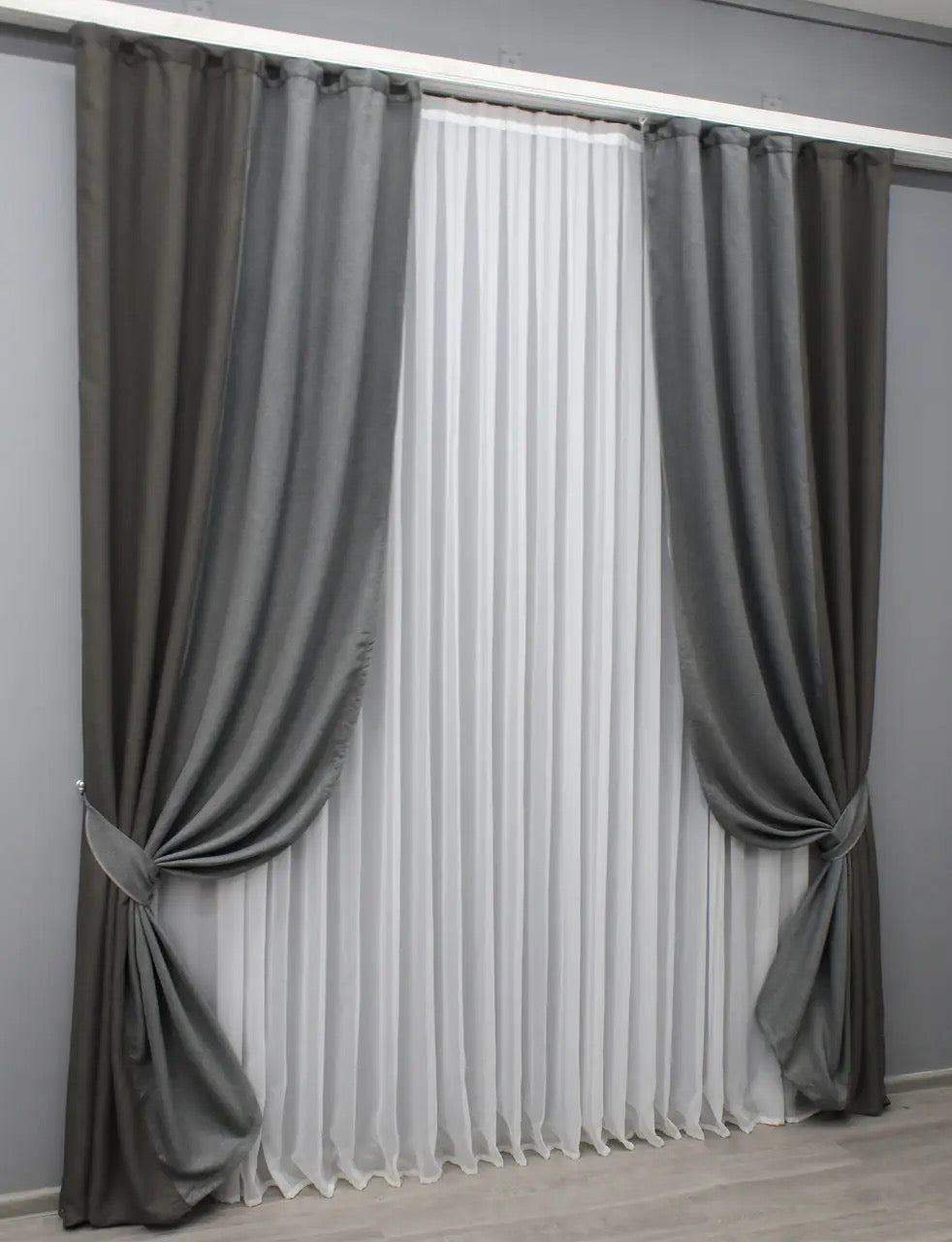 Elegant grey two-tone linen blackout curtains designed for living rooms, bedrooms, and workspaces, combining sophistication and functionality.
